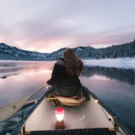 girl riding kayak and enjoy Beautiful view of river