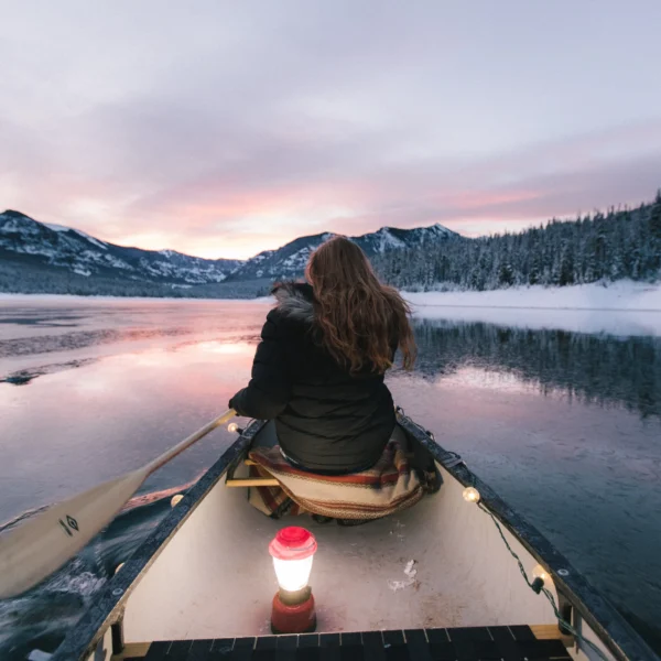 girl riding kayak and enjoy Beautiful view of river